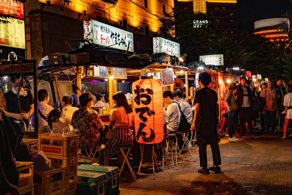 A yatai food stand. A yatai food stand.