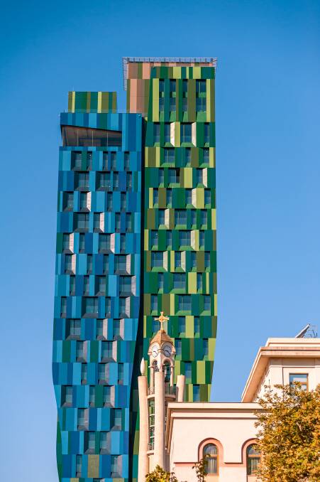 Skyscrapers and an old Catholic church.