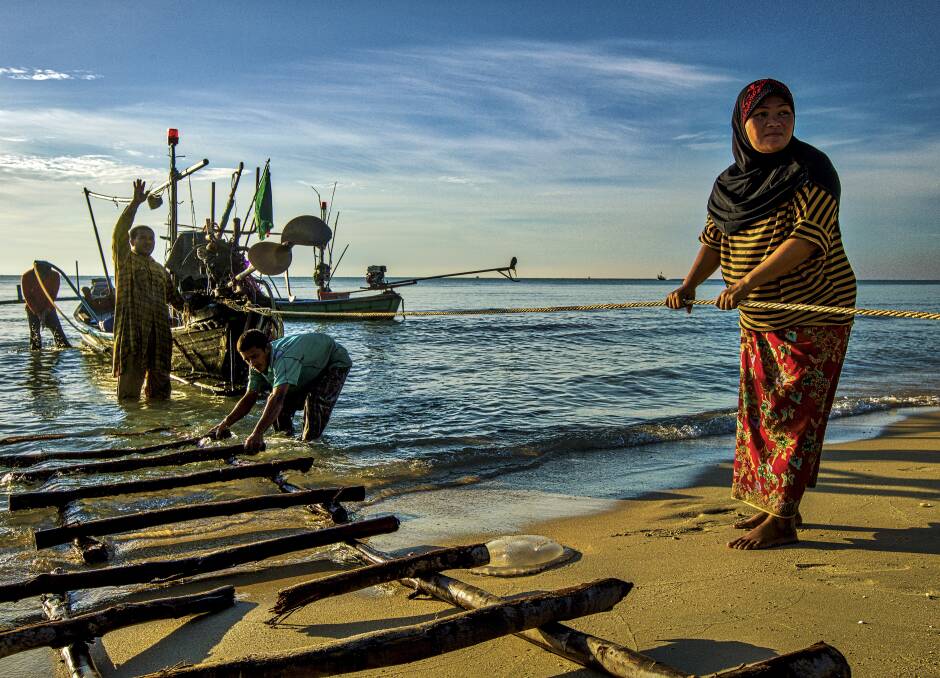 Fishermen of Plai Thon village. Fishermen of Plai Thon village.