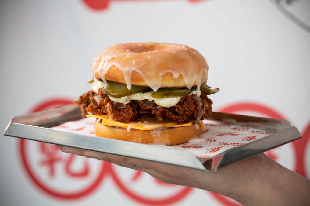 Sneaky Snacky's sweet and salty hot chicken donut burger. Sneaky Snacky's sweet and salty hot chicken donut burger.