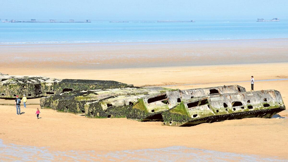 Mulberry harbours on the beach at Arromanches. Picture: Shutterstock