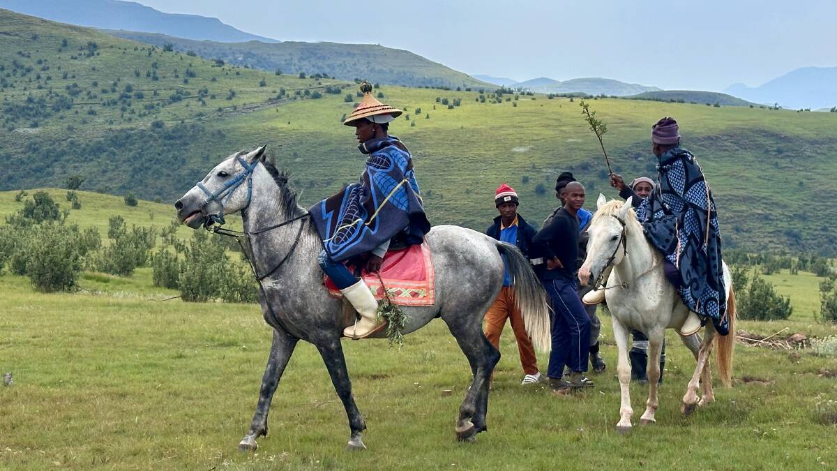 Greeted by Basotho horsemen. Picture by Laura Waters