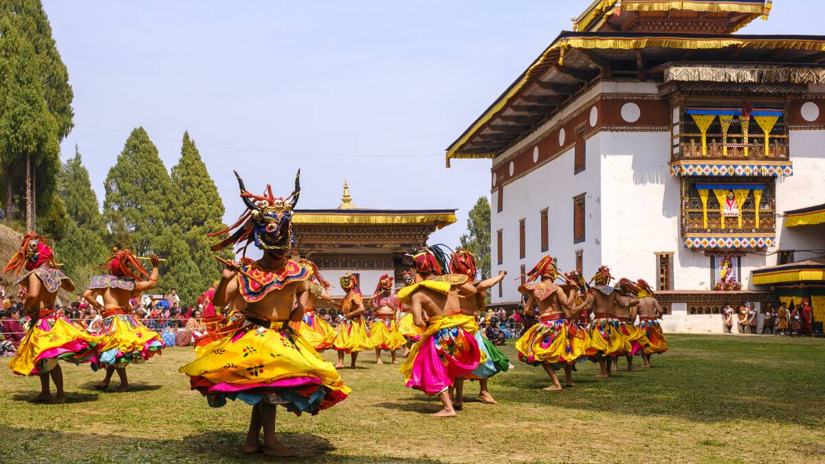 Masked monks dance at Talo Tshechu festival. Picture: Lynn Gail Masked monks dance at Talo Tshechu festival. Picture: Lynn Gail