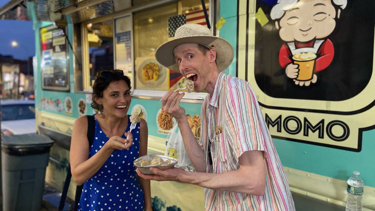 A Jackson Heights food cart. A Jackson Heights food cart.