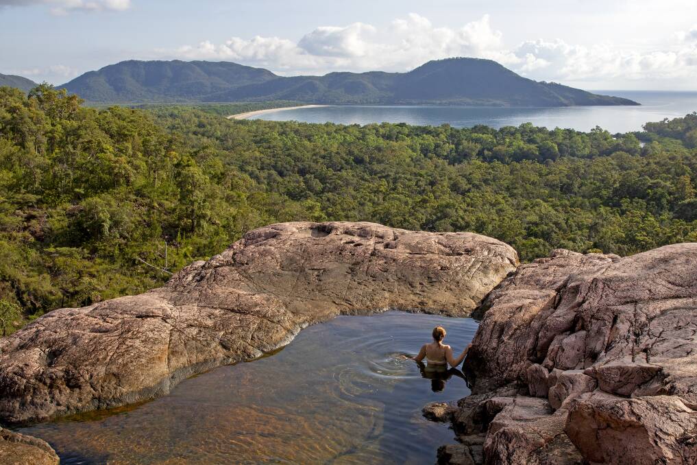 Cooling off on the Thorsborne Trail, Queensland. Picture: Andrew Bain
