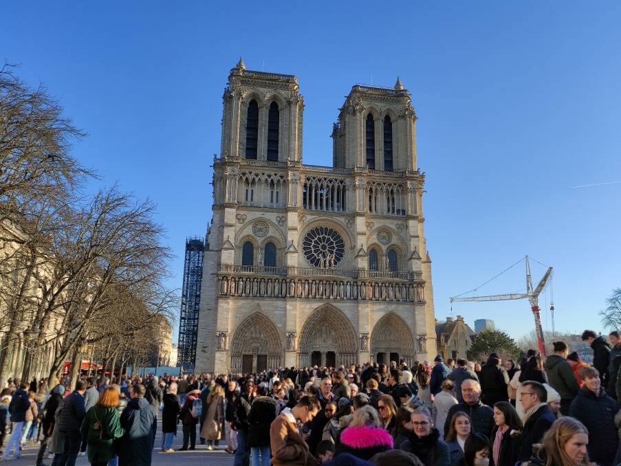Crowds queue for a glimpse inside.