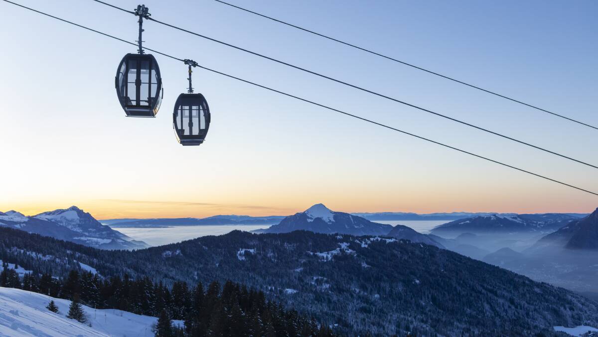 Grand Massif ski area's Vercland gondola rises above Le Mle and the Arve Valley. Grand Massif ski area's Vercland gondola rises above Le Mle and the Arve Valley.
