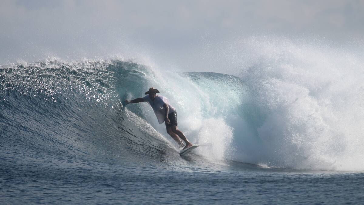 Fatboys owner Brody Ewing rides a perfect wave in Gizo. Fatboys owner Brody Ewing rides a perfect wave in Gizo.
