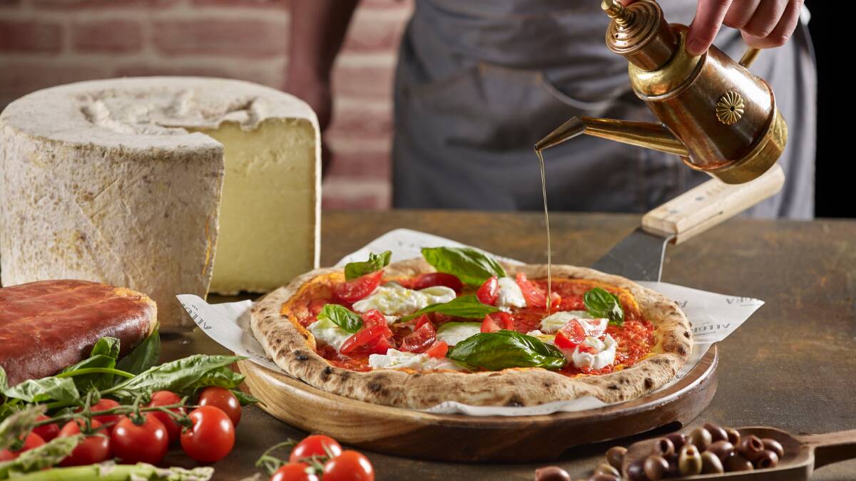 Handcrafted pizza at Allora. Handcrafted pizza at Allora.