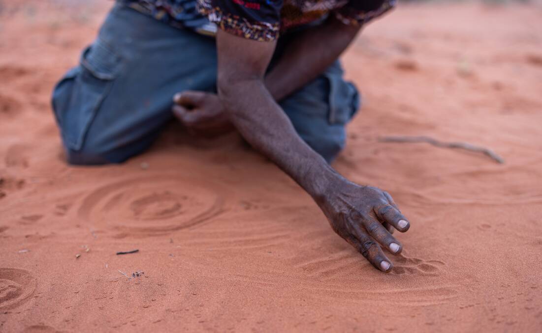 An Anangu guide. An Anangu guide.