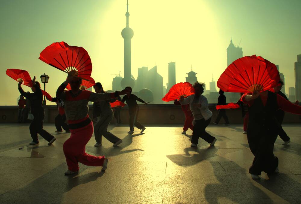 Tai chi fan dance in Shanghai. Picture: Getty Images