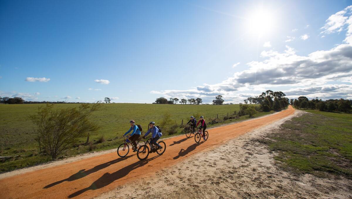 Riding the O'Keefe Rail Trail.