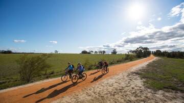 Riding the O'Keefe Rail Trail.