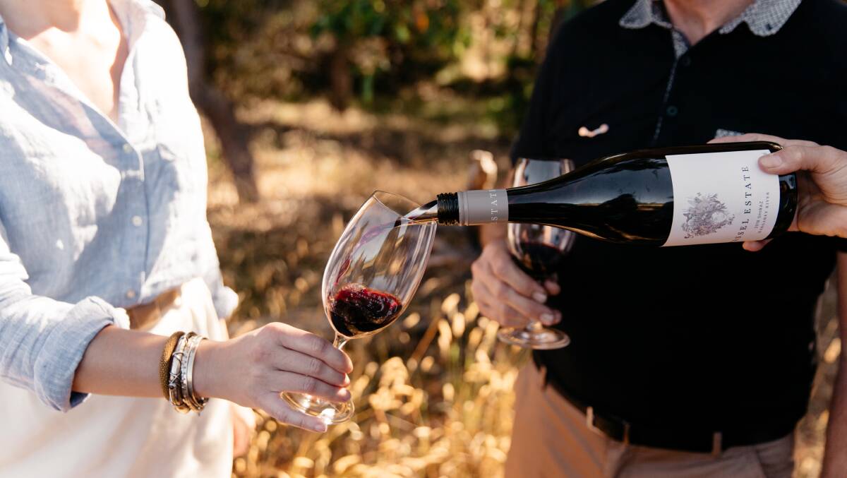 Wine in the vines at Passel Estate. Wine in the vines at Passel Estate.