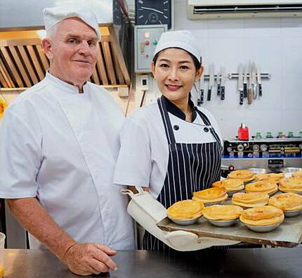Michael and Aong of Tinnies Pies. Michael and Aong of Tinnies Pies.
