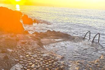Forget the crowds, this is the most magical sunrise swim in Greece