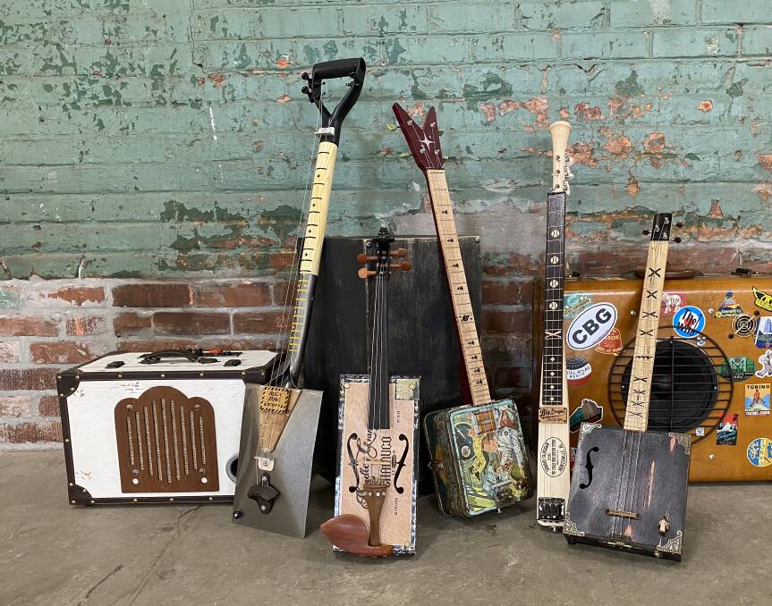 Cigar box guitars in Lowe Mill.