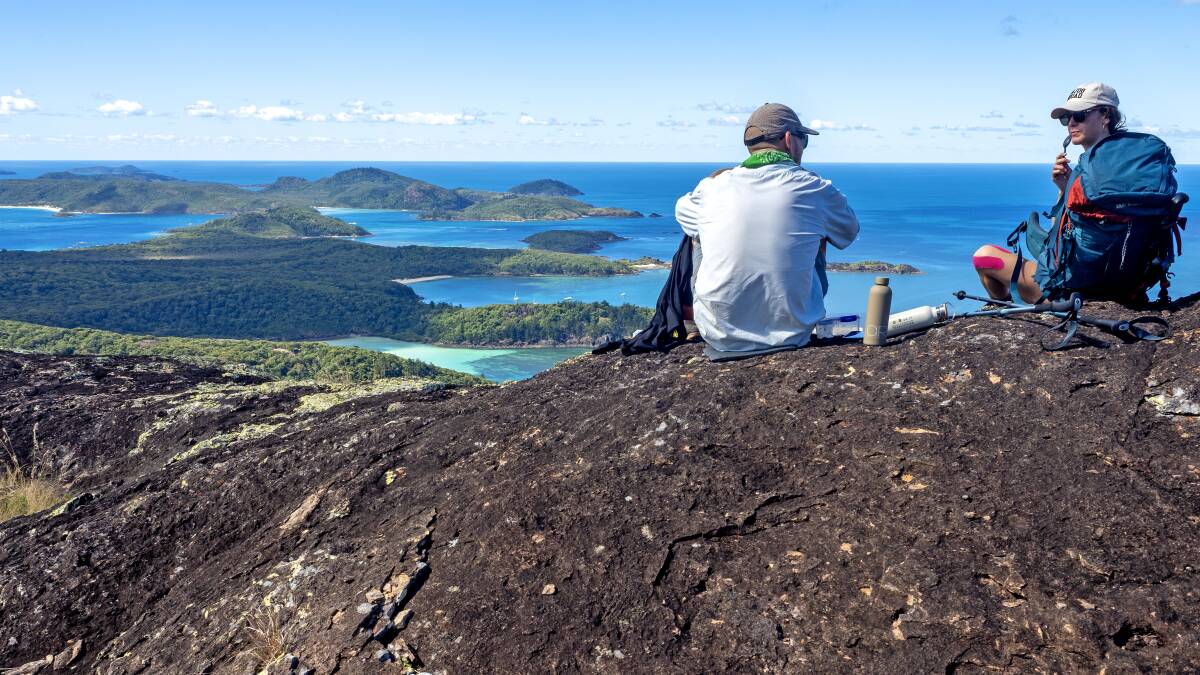 Hikers on Whitsunday Craig on the Ngaro Track. Picture by Andrew Bain