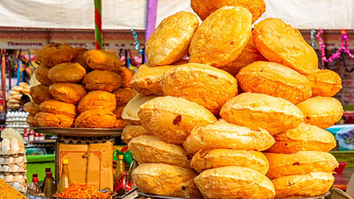 Deep fried Bengali bread on a fair stall. Picture: Getty Images Deep fried Bengali bread on a fair stall. Picture: Getty Images