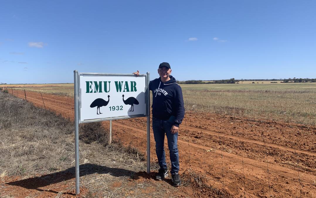 Mark Dapin and the citizen-installed commemorative sign. 