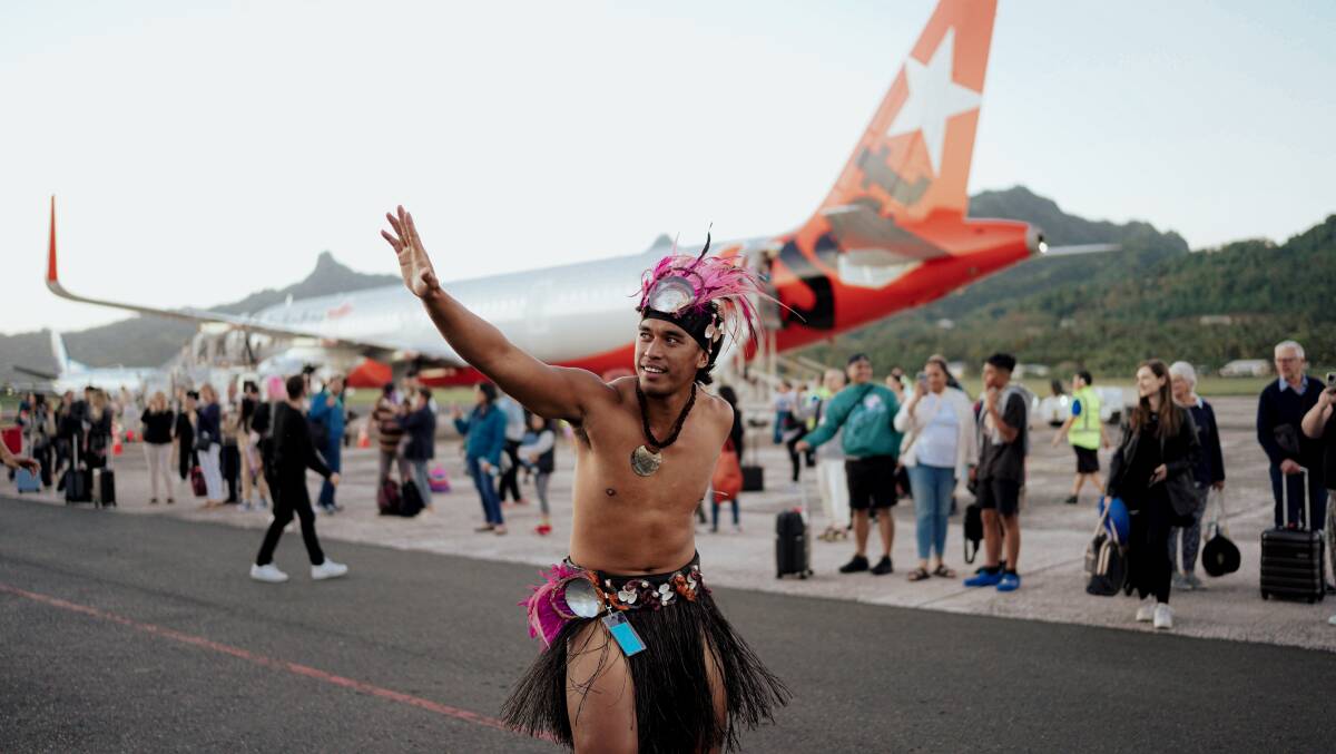 Passengers on Jetstar's inaugural flight receive a Cook Islands welcome.