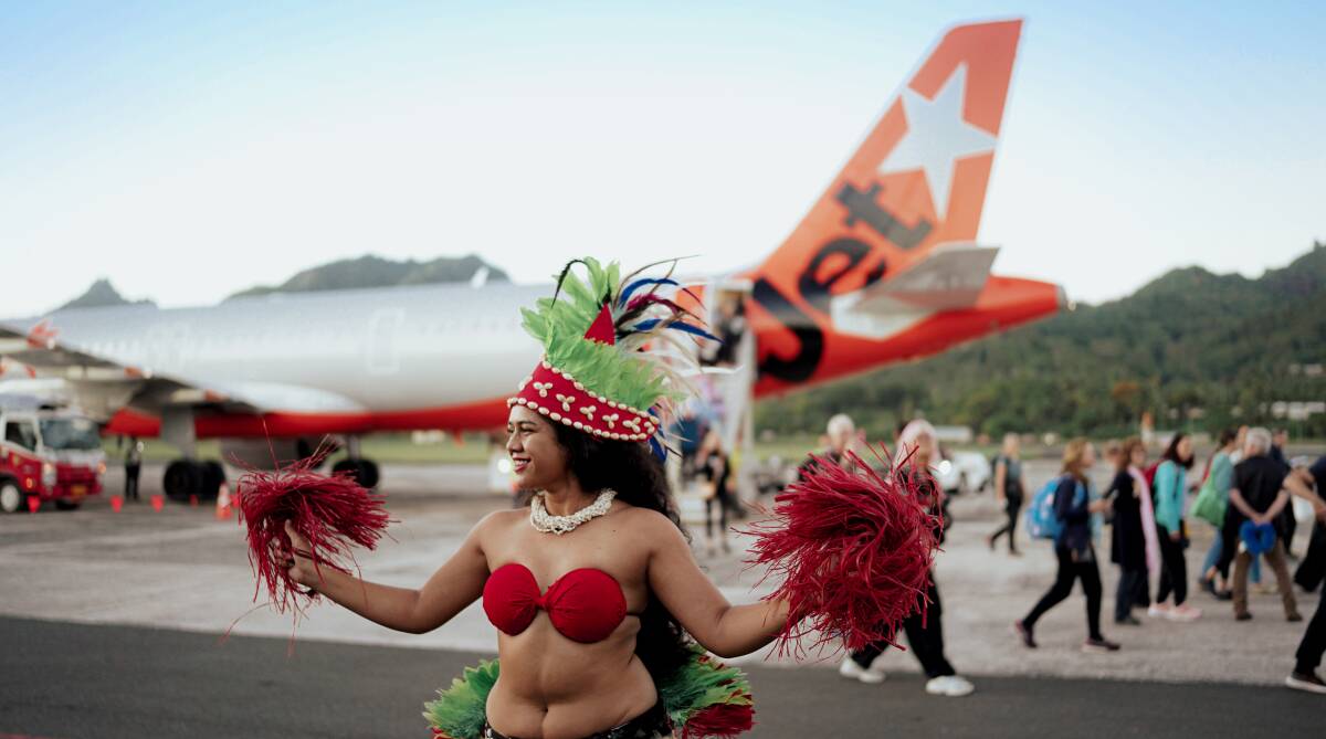 Passengers on Jetstar's inaugural flight receive a Cook Islands welcome.