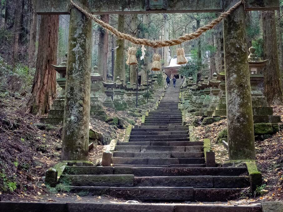 The holy site of Kamishikimi Kumanoimasu, with 100 stone lanterns leading up almost 300 steps. Picture: Emily McAuliffe The holy site of Kamishikimi Kumanoimasu, with 100 stone lanterns leading up almost 300 steps. Picture: Emily McAuliffe