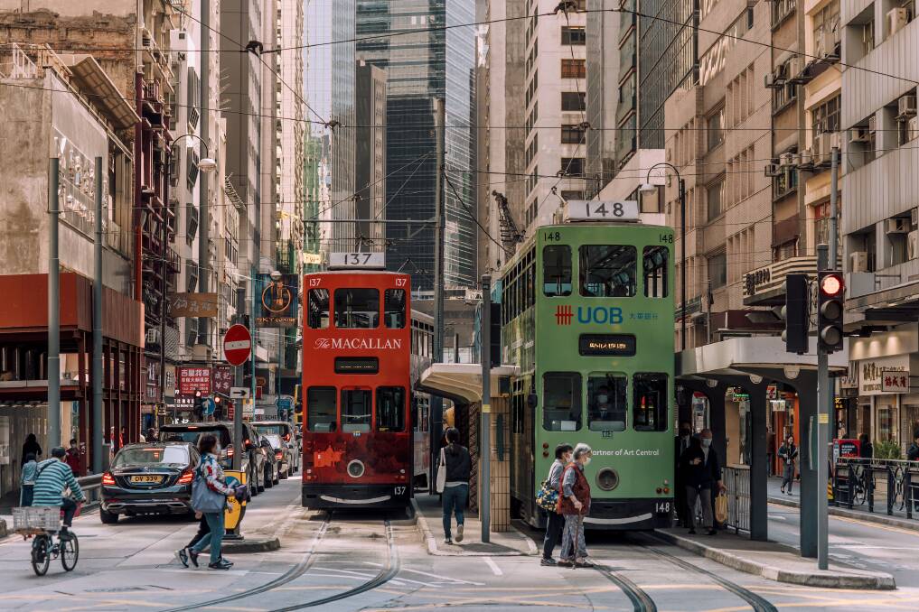 Trams on a Central street. Picture by Hong Kong Tourism Board Trams on a Central street. Picture by Hong Kong Tourism Board