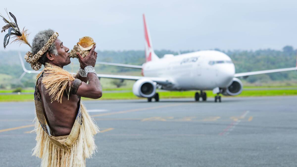 Qantas's inaugural flight from Brisbane to Port Vila lands in Vanuatu. 