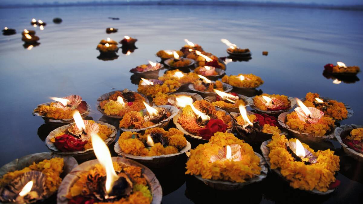 Diya offerings on the Ganges. Picture by Getty Images Diya offerings on the Ganges. Picture by Getty Images