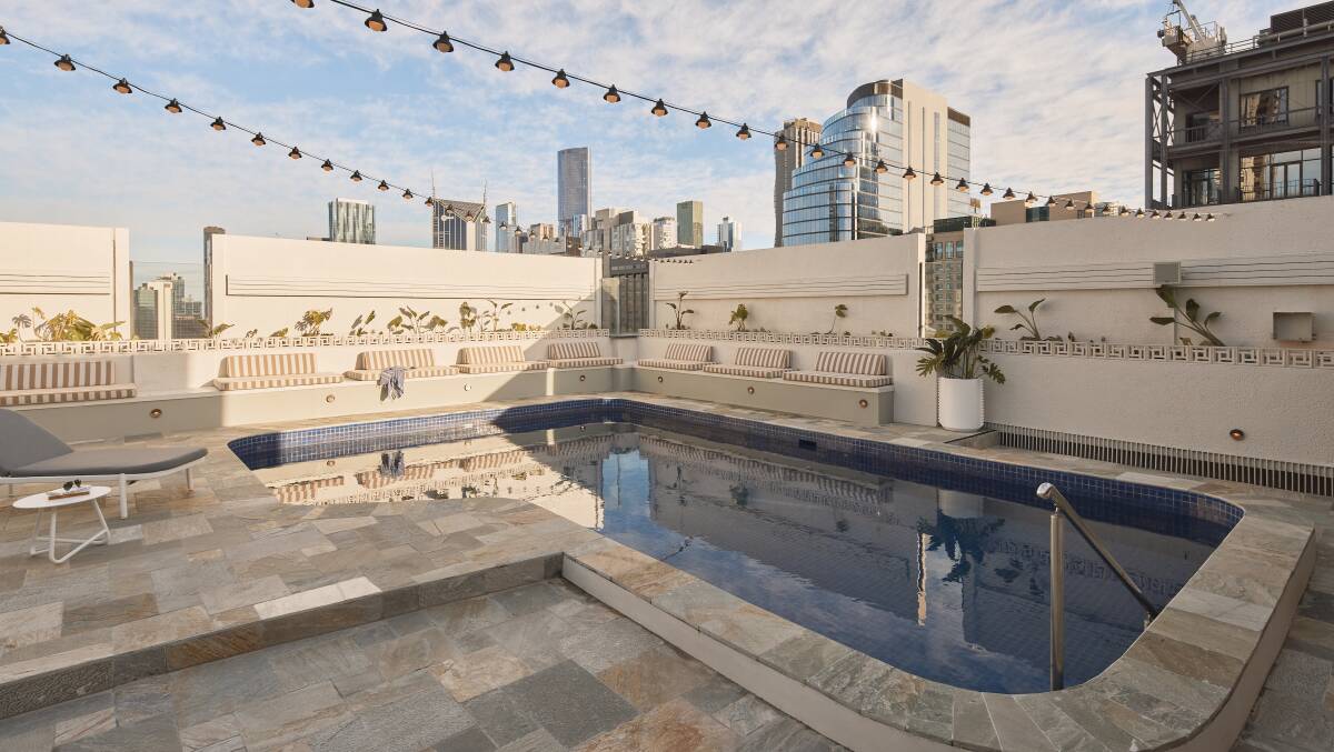 Retro vibes at the rooftop pool. Retro vibes at the rooftop pool.