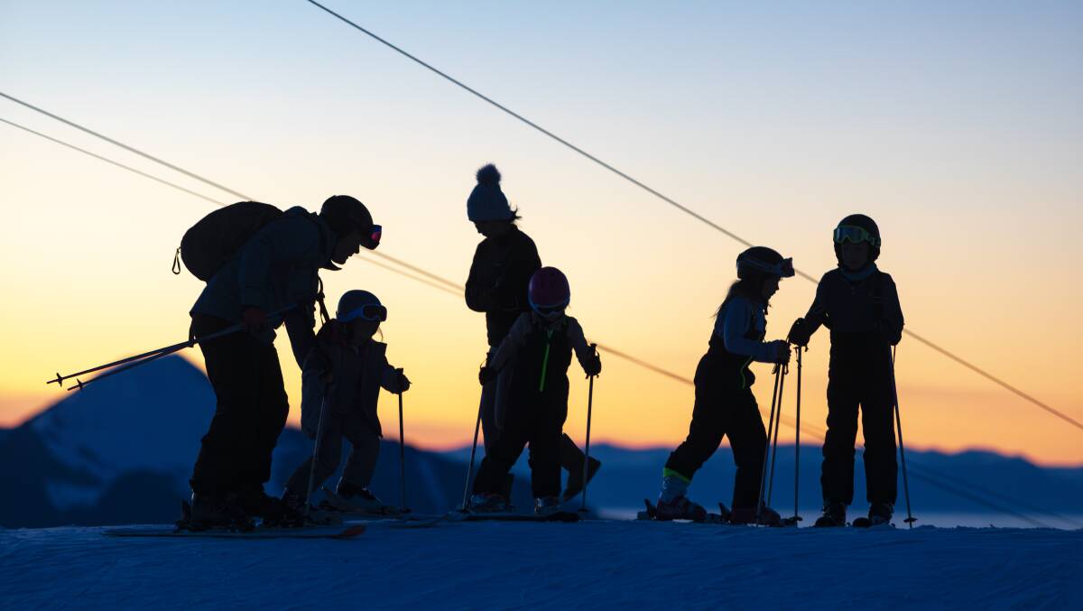 Ski family at a Grand Massif ski area sunset. Picture: Mark Daffey Ski family at a Grand Massif ski area sunset. Picture: Mark Daffey