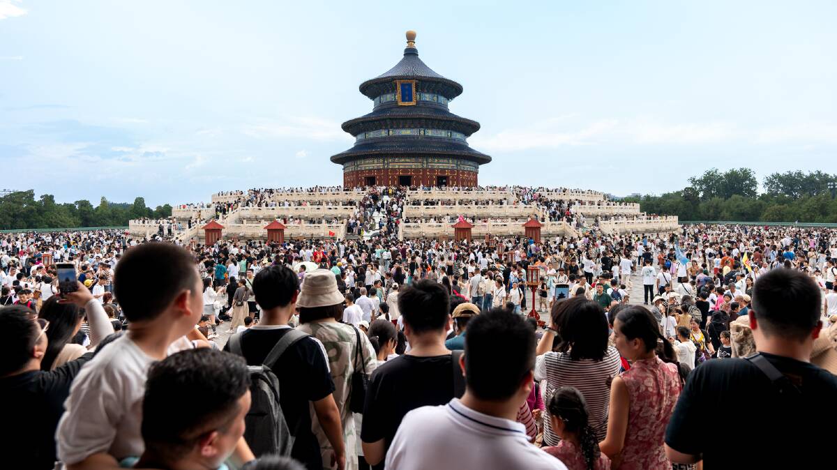 Crowds at the Temple of Heaven in Beijing. Picture: Michael Turtle