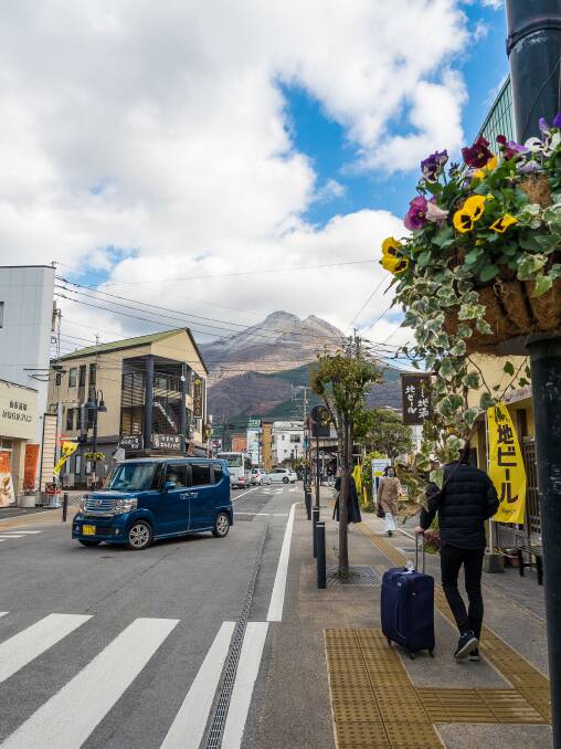 Yufuin, hot spring town at the foot of Mt Yufu on Kyushu island. Yufuin, hot spring town at the foot of Mt Yufu on Kyushu island.