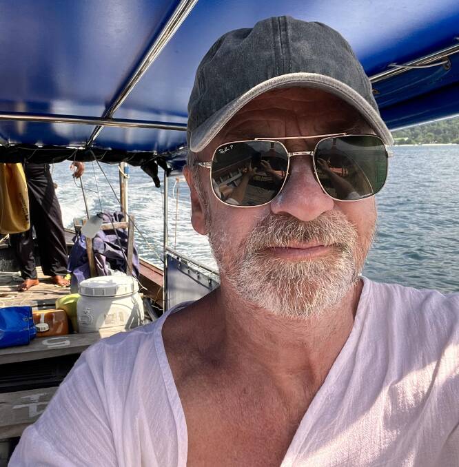 The author on a longtail boat. The author on a longtail boat.