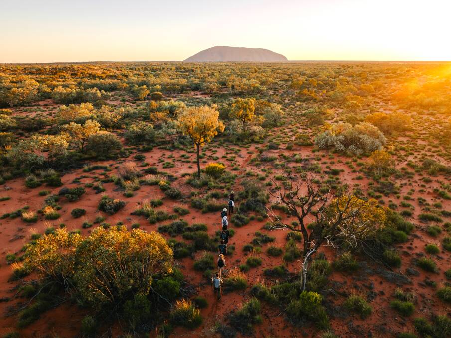 Walkers on the the Uluru-Kata Tjuta Signature Walk. Picture by Michael Peters Walkers on the the Uluru-Kata Tjuta Signature Walk. Picture by Michael Peters