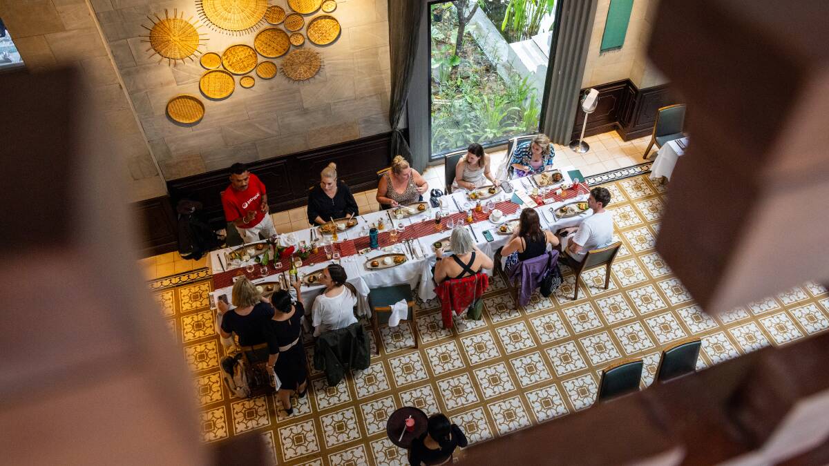 Dining at a Siem Reap restaurant. Picture: Intrepid Dining at a Siem Reap restaurant. Picture: Intrepid