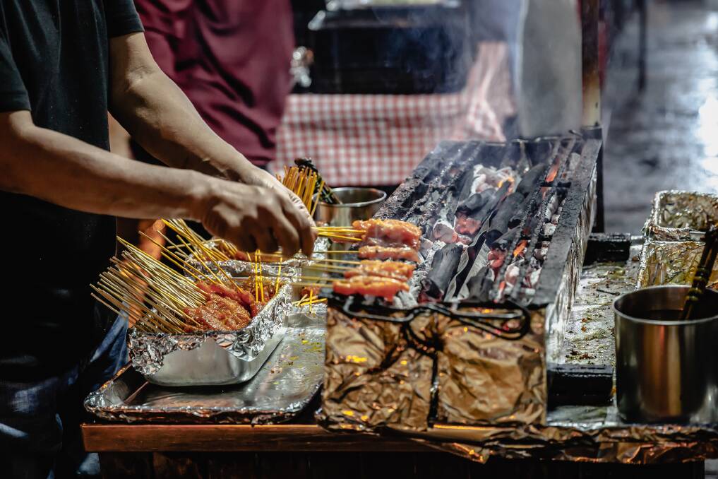 Singapore hawker stall. Picture: Getty Images Singapore hawker stall. Picture: Getty Images