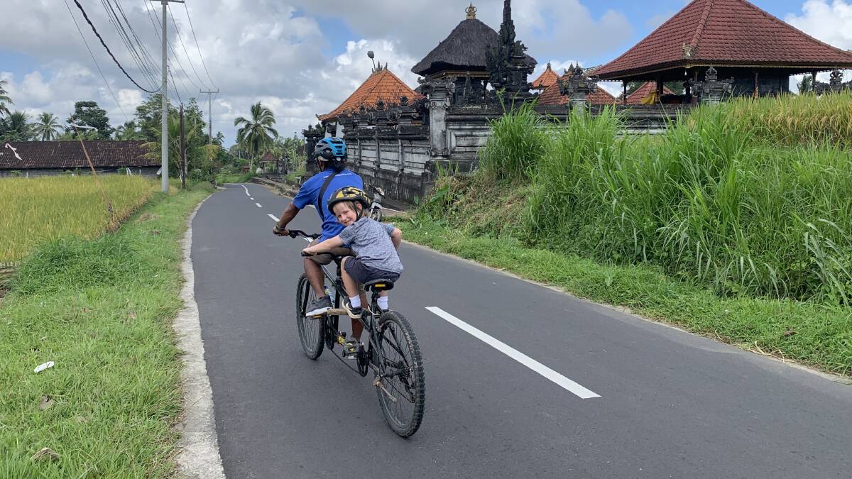 Oliver riding tandem on the Bali Eco Educational Cycling Tour. Picture by Angela Saurine Oliver riding tandem on the Bali Eco Educational Cycling Tour. Picture by Angela Saurine