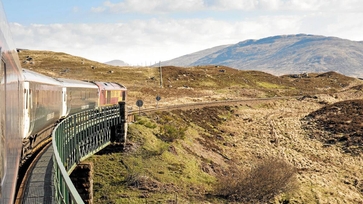 The Caledonian Sleeper crosses Rannoch viaduct in the Scottish Highlands The Caledonian Sleeper crosses Rannoch viaduct in the Scottish Highlands