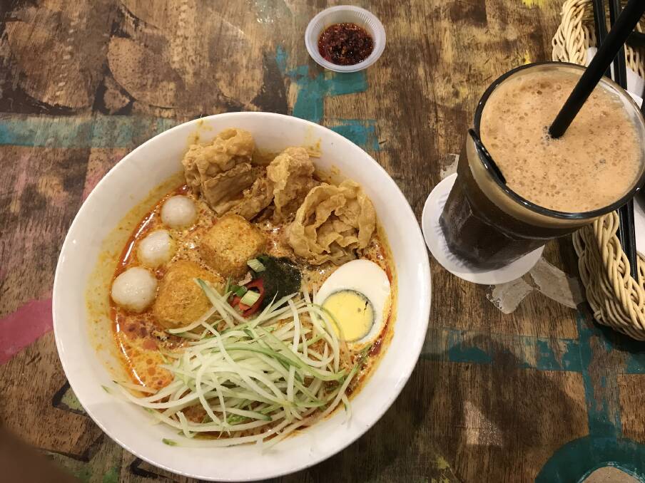 Laksa is served. Laksa is served.
