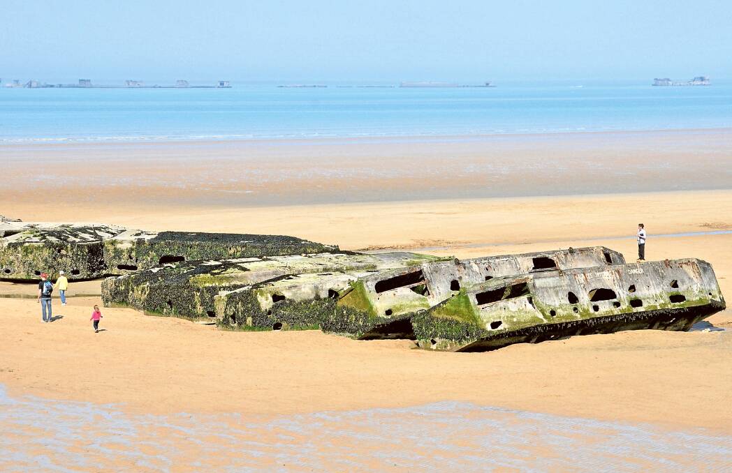 Mulberry harbours on the beach at Arromanches. Picture: Shutterstock