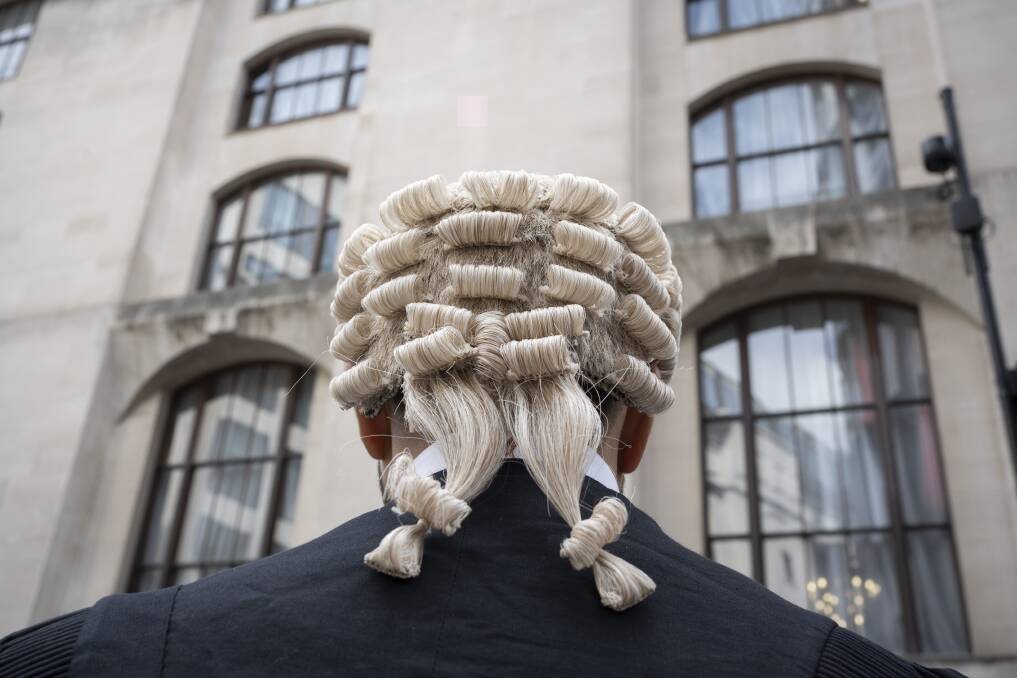 A barrister outside the court. Picture by Getty Images