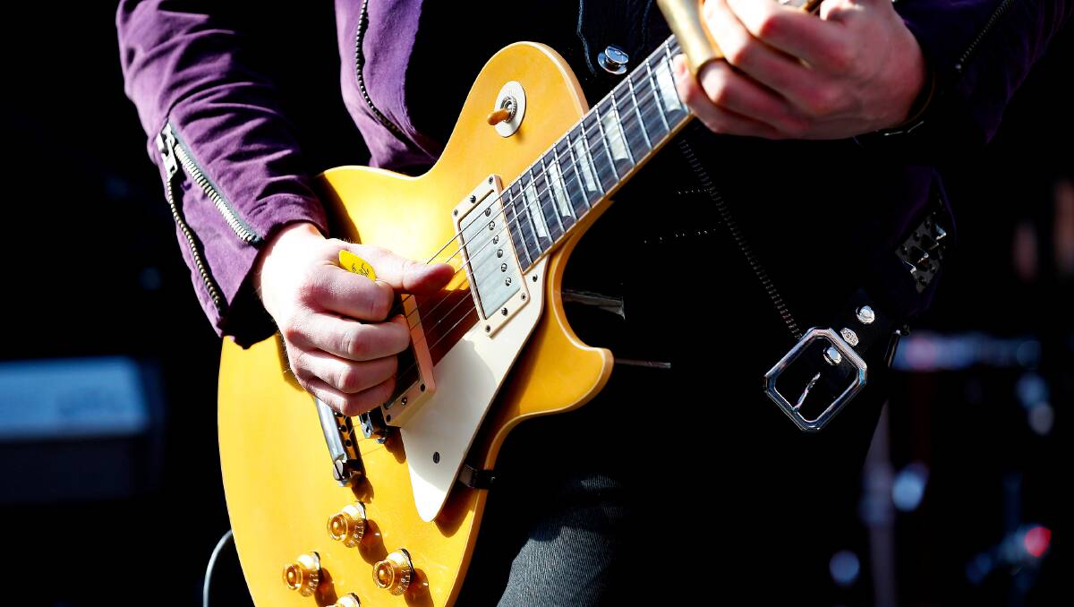 A live guitar performance. A live guitar performance.