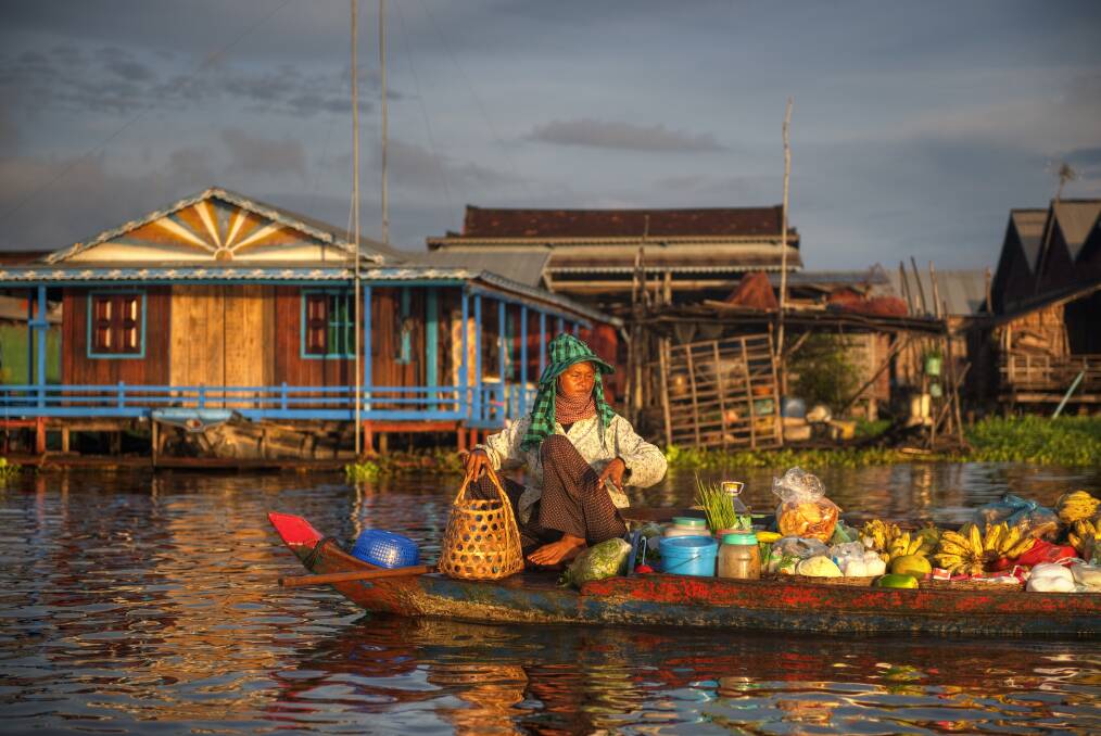A market seller at the floating village of Kampong Kleang, Siem Reap. Picture: Getty Images A market seller at the floating village of Kampong Kleang, Siem Reap. Picture: Getty Images