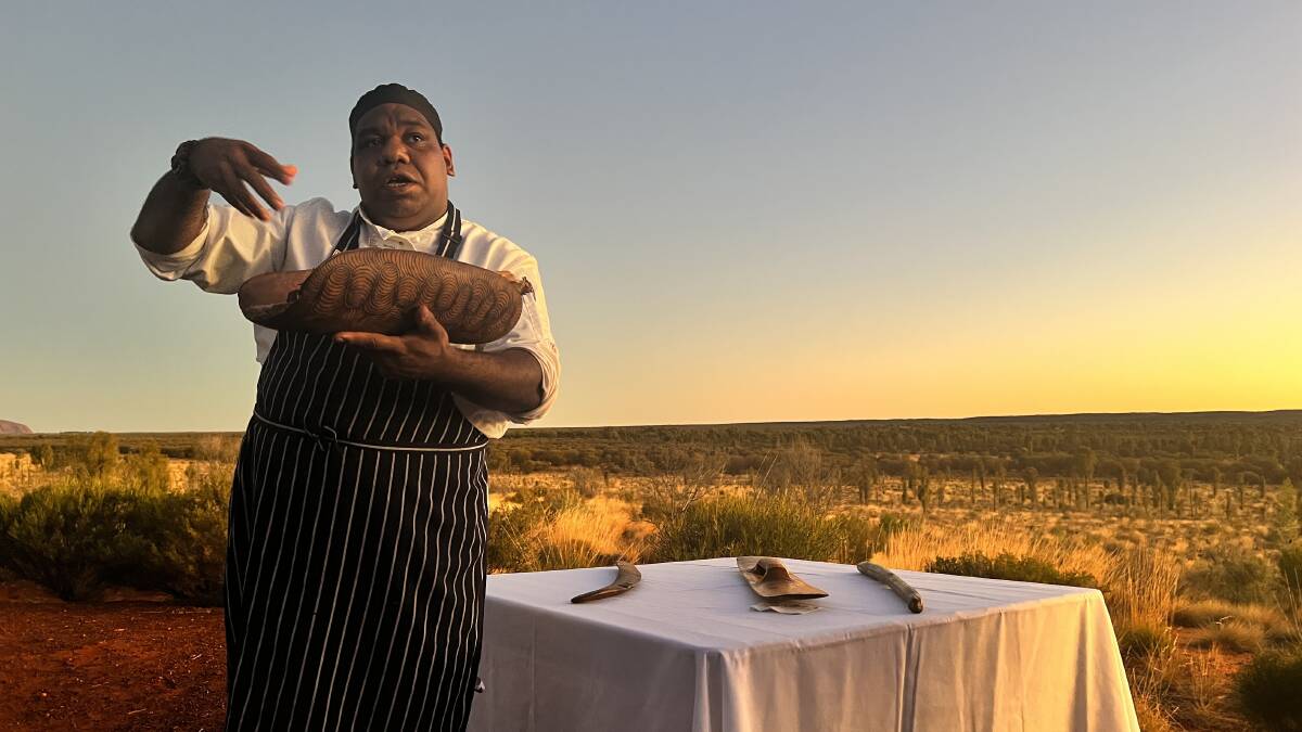 Award-winning chef Marcellus Ah Kit introduces the bush foods used in the Tali Wiru sunset meal near Uluru. Picture: Saffron Howden Award-winning chef Marcellus Ah Kit introduces the bush foods used in the Tali Wiru sunset meal near Uluru. Picture: Saffron Howden