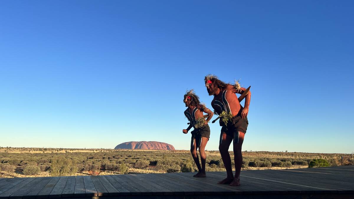 Anangu dancers perform in front of Uluru before the launch of the Wintjiri Wiru drone, sound and light show in the Northern Territory on May 10, 2023. Picture: Saffron Howden Anangu dancers perform in front of Uluru before the launch of the Wintjiri Wiru drone, sound and light show in the Northern Territory on May 10, 2023. Picture: Saffron Howden