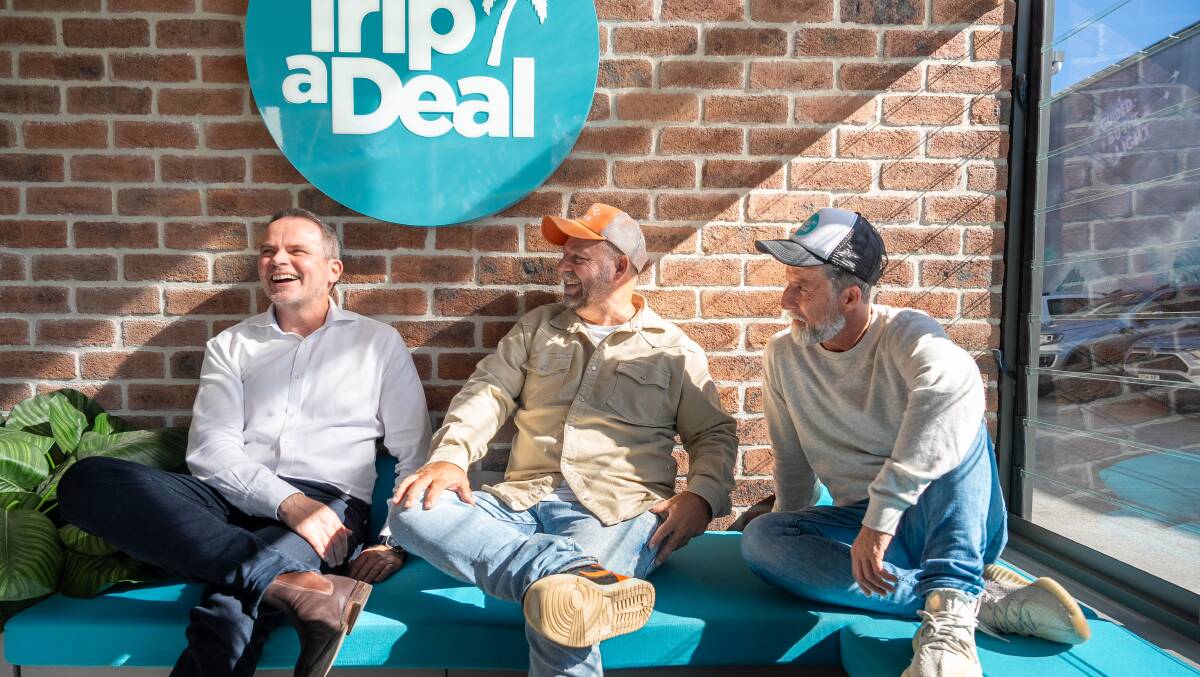 Andrew Glance from Qantas, and Richard Johnston and Norm Black from TripADeal. Picture: Qantas
