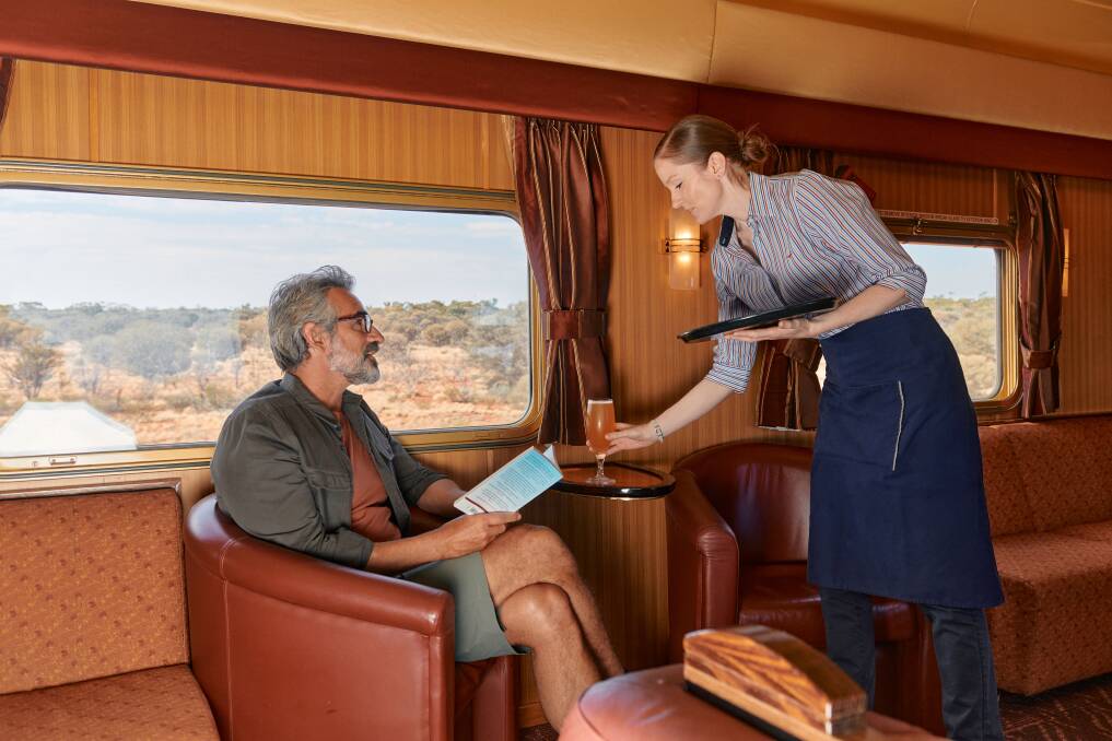 Relax and get to know fellow guests in the Outback Explorer lounge aboard the Great Southern.