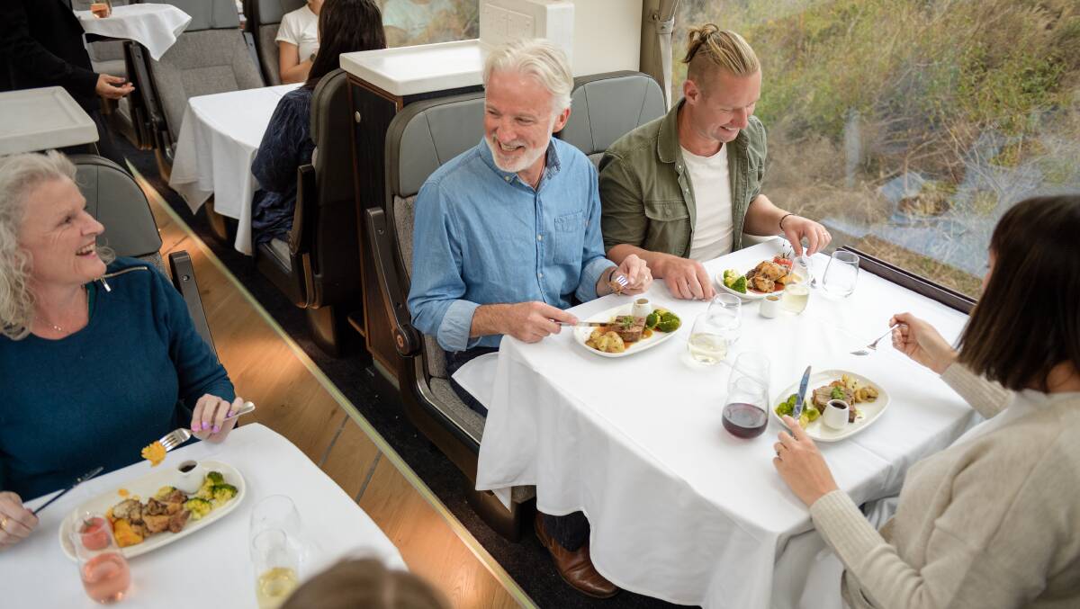 Guests enjoying a seven-course meal. Guests enjoying a seven-course meal.